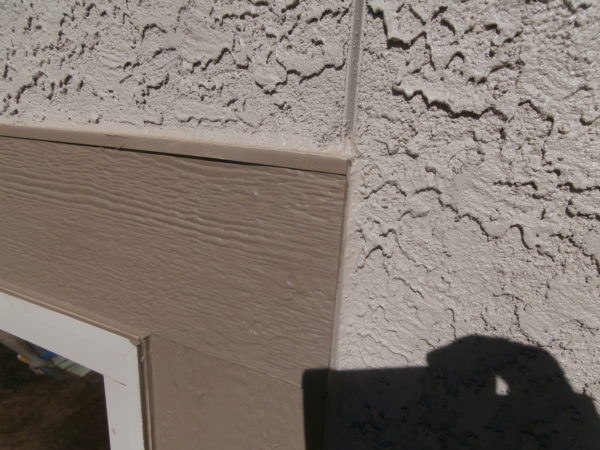 Stucco flashing should not be sealed above window